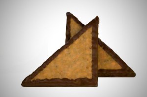 Sypký produkt hnědé barvy pro výrobu výborných ořechových trojhránků.